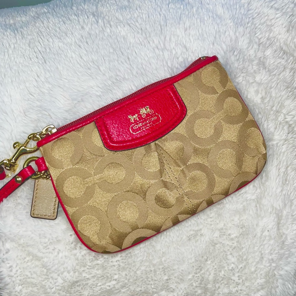 Vintage pink and tan leather coach wristlet